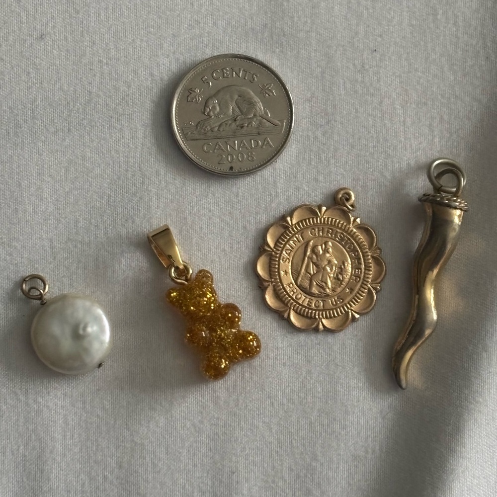 Gold pendant bundle of four